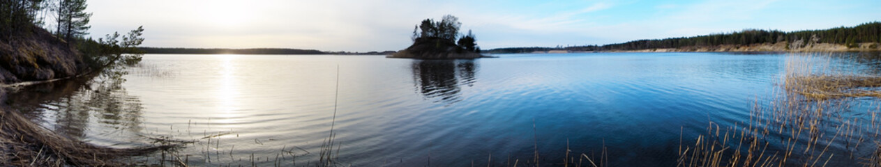 Panorama lake with island sunset and reflection on bueautiful morning