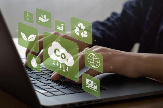 Environmental energy reduction concept. CO2 emissions with global warming icons. with business men typing computers