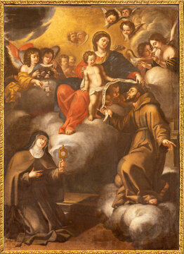 MATERA, ITALY - MARCH 7, 2022: The baroque painting of Madonna with the St. Francis of Assisi and St. Clare in the church Chiesa di Santa Chiara by unknown artist of 18. cent.