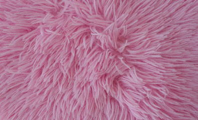 Pink artificial fur background. Copy space, space for text.  