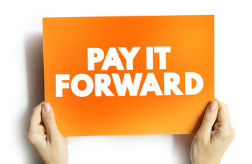 PAY IT FORWARD text quote on card, concept background