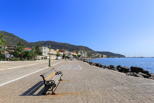 Bench on the promenade near the sea on the island of Methana