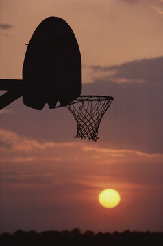 Bascketball hoop sunset
