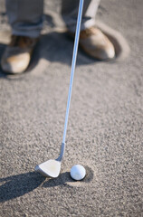 Golf ball on sand