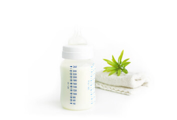 Baby bottle with diaper on white background - 503964702
