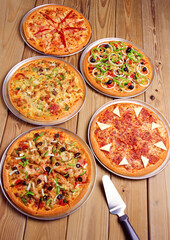 set with different pizza