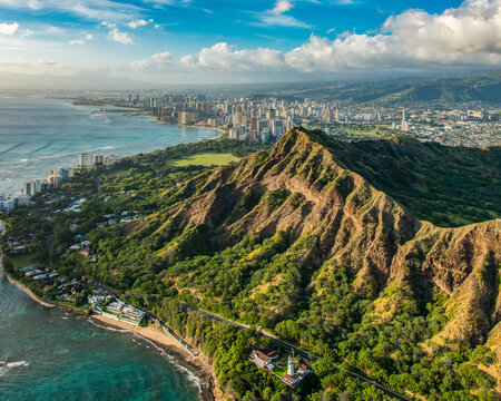 Aerial view of Diamond Head Crater with Honolulu cityscape in the distance, Oahu, Hawaii, USA