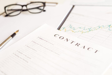 White table with business document contract form paper and empty space to sign authorized signature, copy space available for text