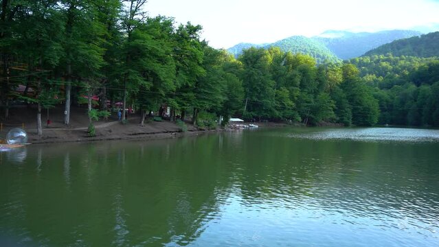 Close view Parz lake in Armenia, Caucasus. Lake in forest. lake among green trees.