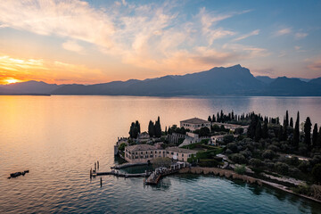 Punta San Vigilio, Garda Lake at sunset, aerial view. Italy