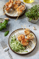 Ketogenic diet. Detox and healthy concept. Rolls bacon wrapped chicken wish cucumber noodles and radish microgreens.
