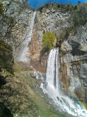 Details of the Seerenbach Waterfall with rainbow at Betlis village over the Swiss Walensee Lake