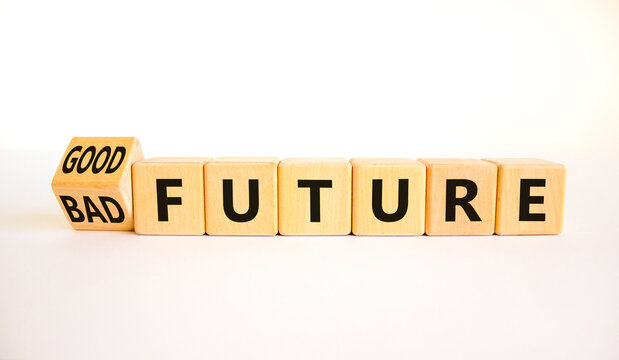 Good or bad future symbol. Turned wooden cubes and changed concept words Bad future to Good future. Beautiful white table white background, copy space. Business bad or good future concept.