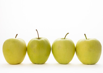 Fresh green apples isolated on white background. Environmentally friendly product.
