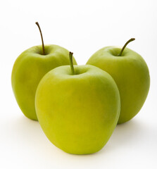 Fresh green apples isolated on white background. Environmentally friendly product.
