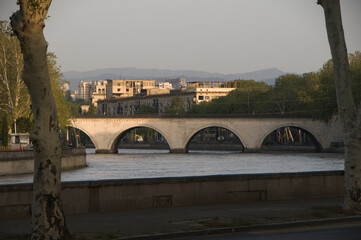 old bridge over the river at dawn
