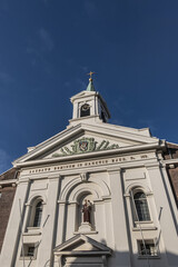 Church of Saint Anthony of Padua (Sint-Antoniuskerk or Paterskerk, 1640) on Nieuwe Groenmarkt square. It is also called Green Market Church (Groenmarktkerk). Haarlem, North Holland, the Netherlands.