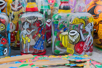 Bright colorful terracotta bottles, works of handicraft, on display during Handicraft Fair in Kolkata - the biggest handicrafts fair in Asia.