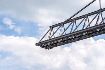 The end of the truss of a container crane on rails on the banks of the Rhine in Germany.
