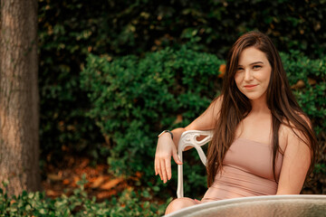 woman sitting on a bench in the park