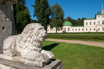 Village of Stepanovskoe-Volosovo. Russia, Tver region.  Stone lion, guarding the entrance to the estate. Sculptural fragment of the entrance gate to the Kurakins' estate.