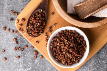 Chinese pepper, Sichuan pepper in bowl. Dry Sichuan Pepper Spice.