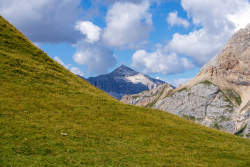 A view in the distance of the silhouette of Piz Boe in the Sella group. Dolomites.
