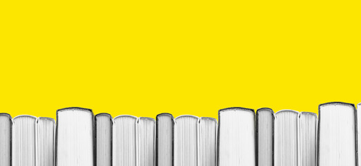 Banner with book border on yellow background, copy space. High quality photo