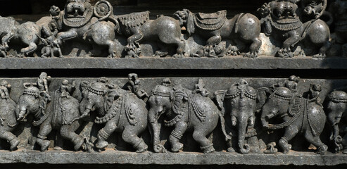 Sculptures on the outer walls of Hoysaleswara Temple at Halebidu, the former capital of the Hoysala, Karnataka.