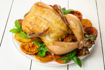 Grilled chicken with caramelized apples and oranges