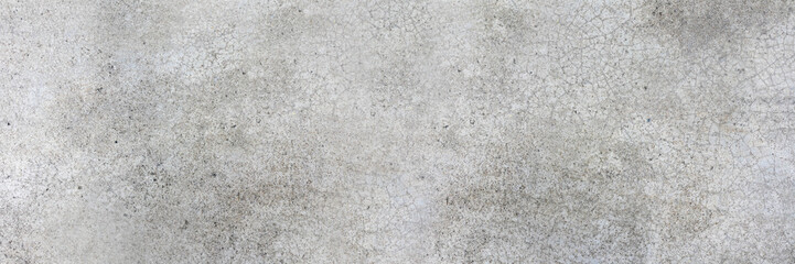 Concrete wall background with small cracks of the wall,decorative concrete wall