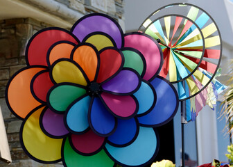 brightly colored whirligig wind sculpture