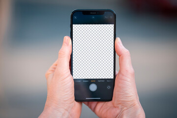Hands holding phone with blank screenб Transparent screen.