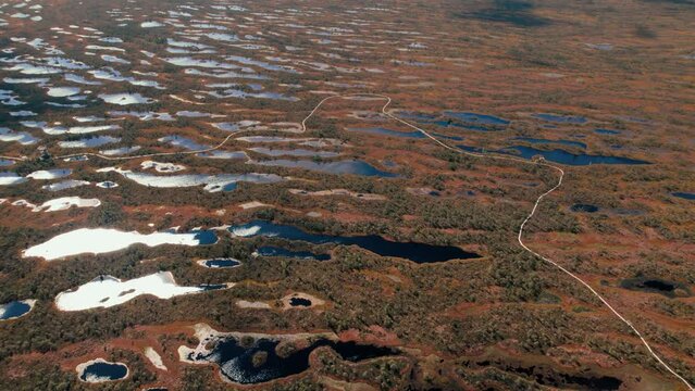 Aerial drone view over trails and lakes in Kemeri National Park, Jurmala, Latvia, Europe