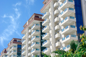 A beautiful modern residential complex consisting of several high-rise apartment buildings.