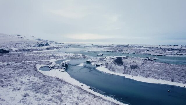Mountain panorama, volcanic landscape and river, glacier river,above, aerial view, in snowy winter, wild nature, Icelandic Highlands, Pakgil, Suourland, Iceland, Polar Regions