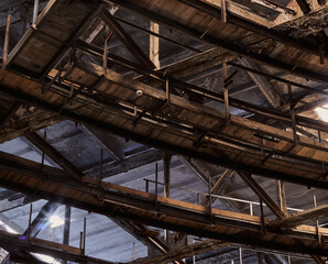Metal wooden ceiling construction in an abandoned building. 