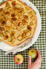 Traditional homemade apple pie. Dutch baby pancake. Top view