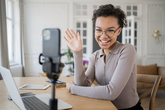 Video call the blogger uses the phone. Freelancer millennial chat online.