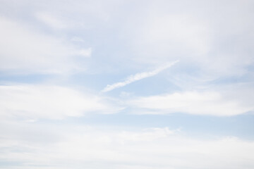 Naklejka na ściany i meble Sky on a cloudy day. Blue sky with clouds. Cloudiness