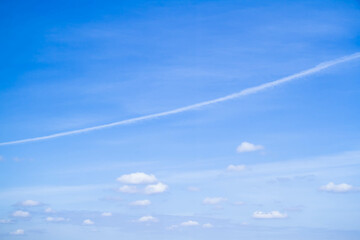 Cumulus clouds. White clouds on a blue background.