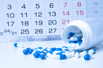 Medication course. Treatment schedule. Tablets and calendar.