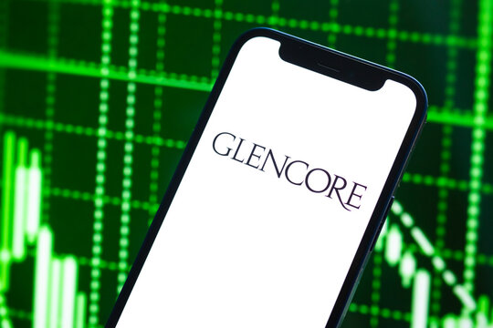 Glencore logo company, gas and oil prices, energy industry. Petroleum stock market graphs, global financial background. Gasoline and diesel concept
