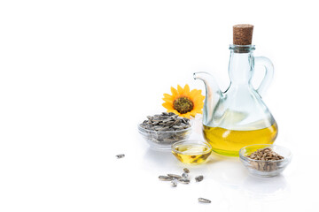 Sunflower oil and sunflower seeds  isolated on white background with copyspace.