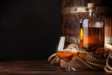 Glass and bottle with cognac