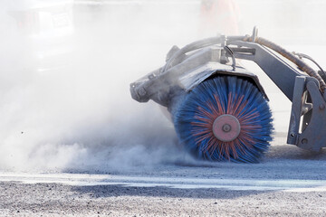 Sweeper. Rotating brush of street sweeper cleaning machine. Sweeping equipment