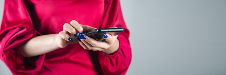 Woman using mobile phone.