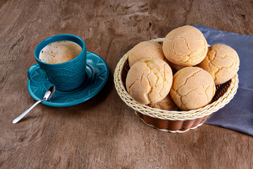 Typical Brazilian cheese bread in a basket with coffee