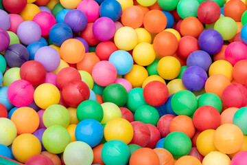Fototapeta na wymiar Background of colored balls. Colored pool balls for children