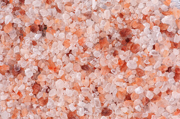 .Himalayan pink salt background. Copy space.